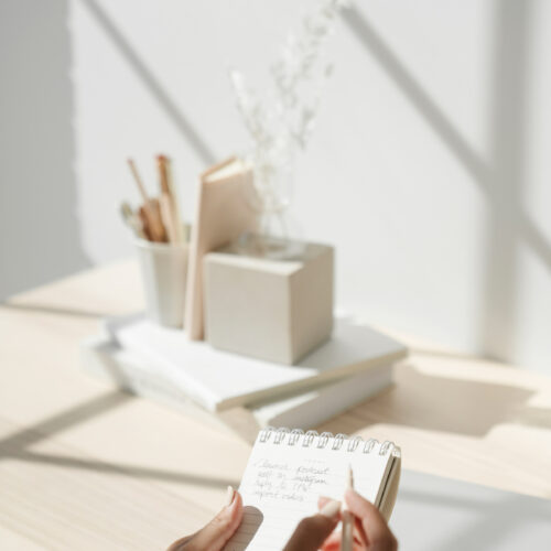 woman at desk preparing for a productive day