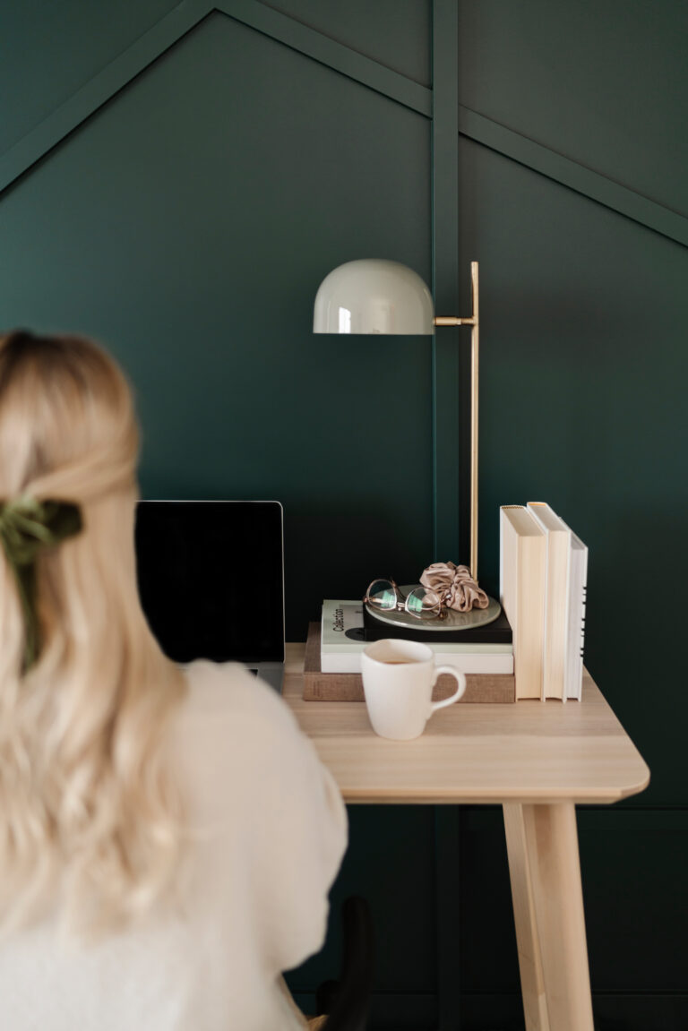 woman sitting at desk setting healthy boundaries at work