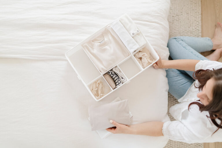 woman organizing to declutter for mental health