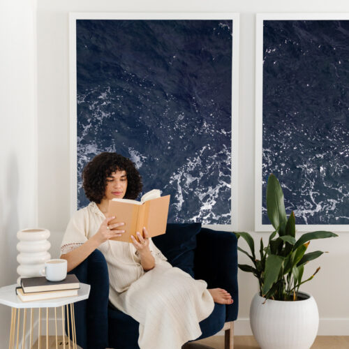 woman reading in chair practicing self-care