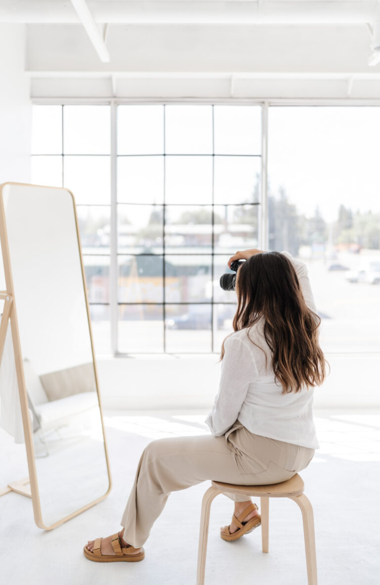 woman looking in the mirror