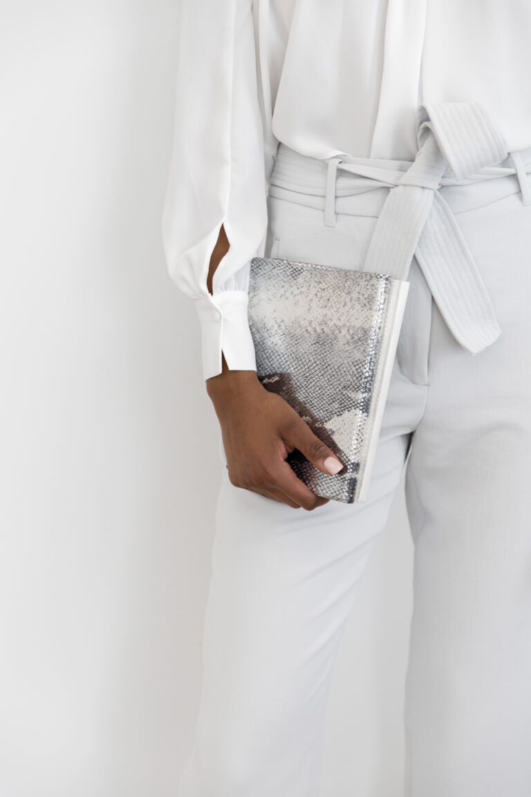 woman holding a journal for mental health