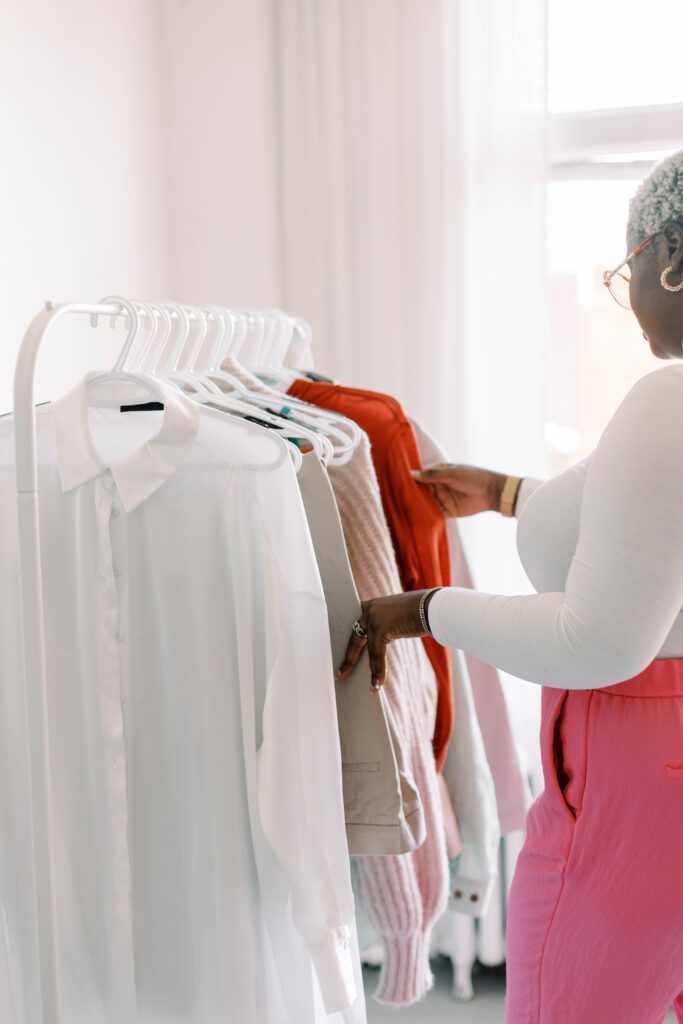 woman choosing clothes to improve  self confidence