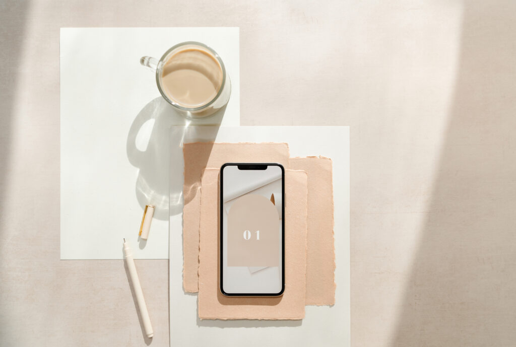 coffee, phone, paper and pen to prepare for time batching