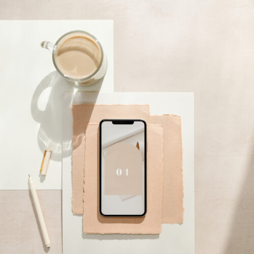 coffee, phone, paper and pen to prepare for time batching