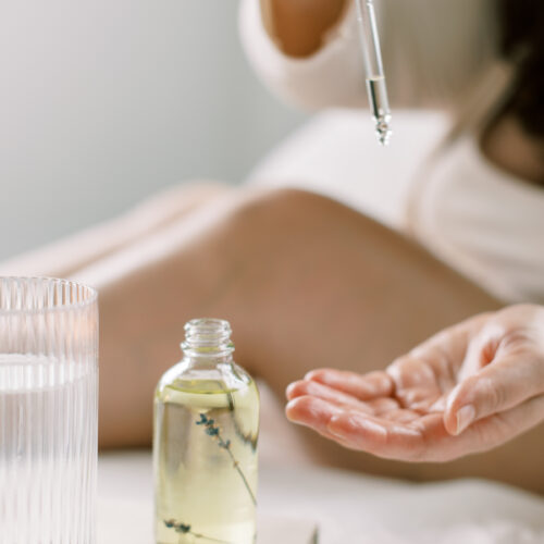 woman using essential oils for confidence