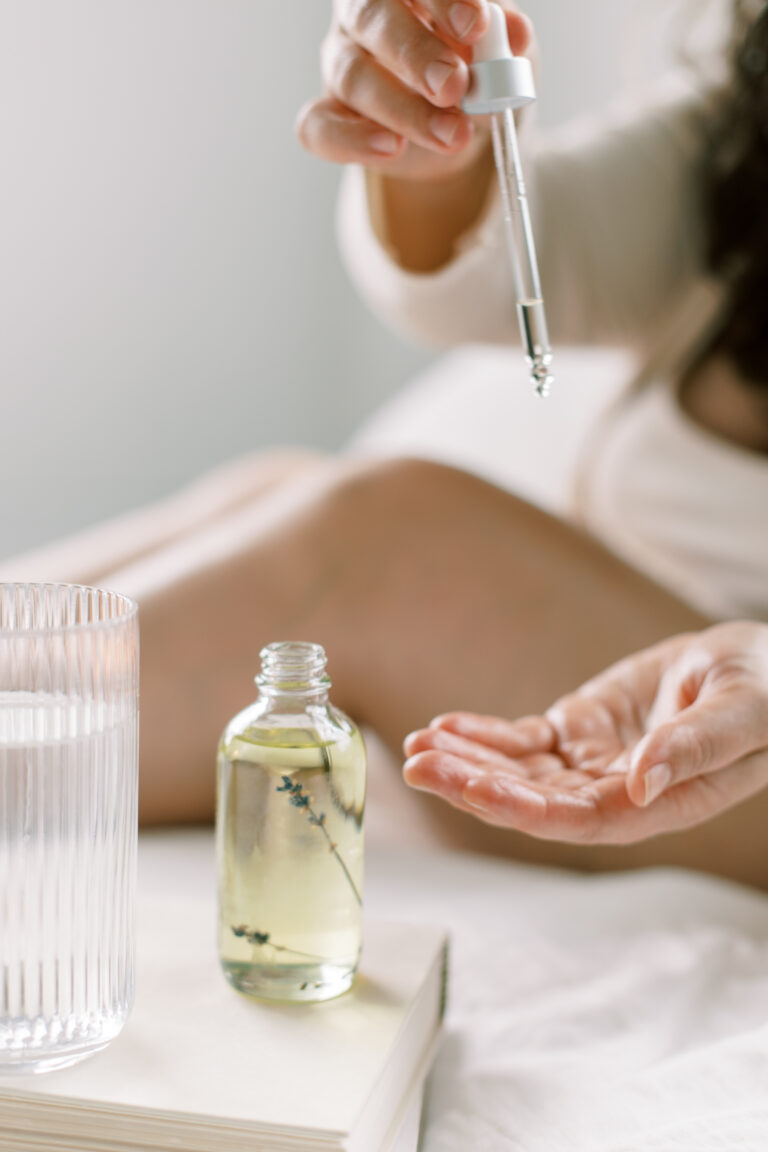 woman using essential oils for confidence