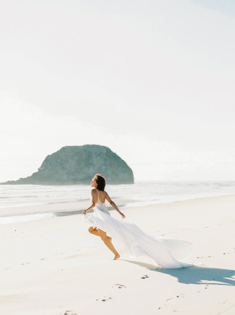 woman running on the beach with positive energy