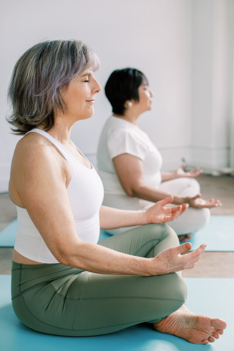 two women meditating