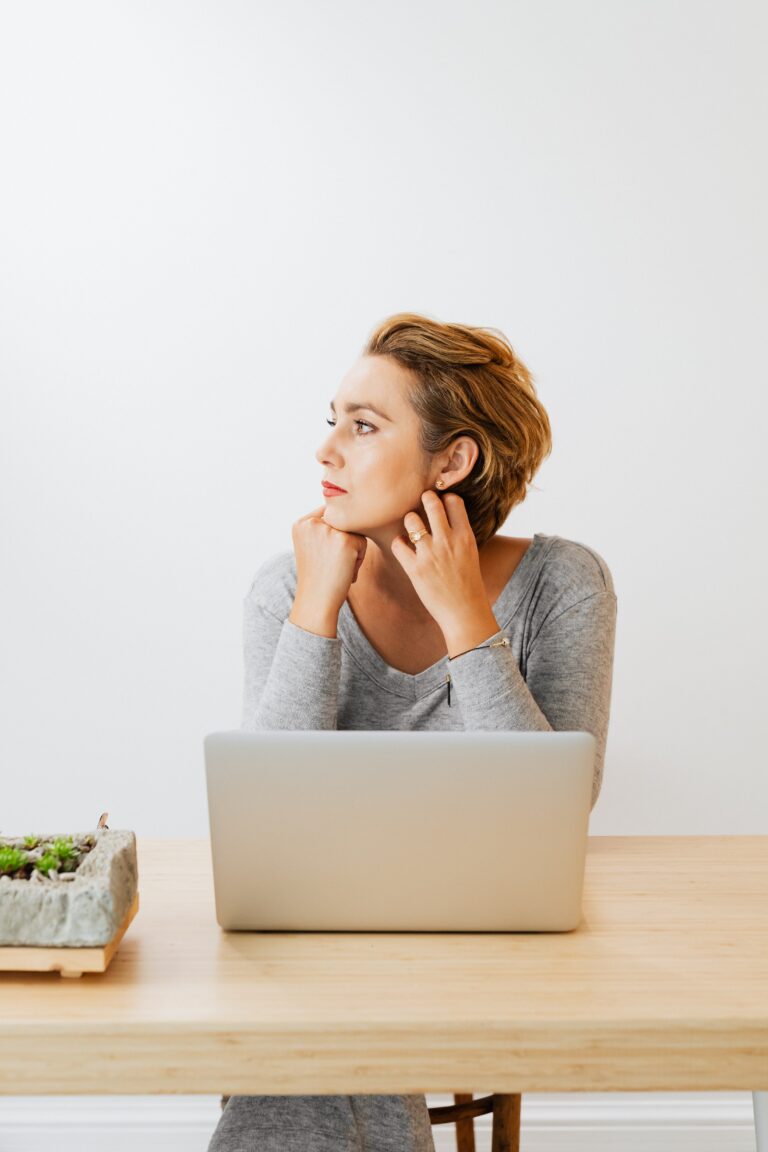 woman sitting with laptop