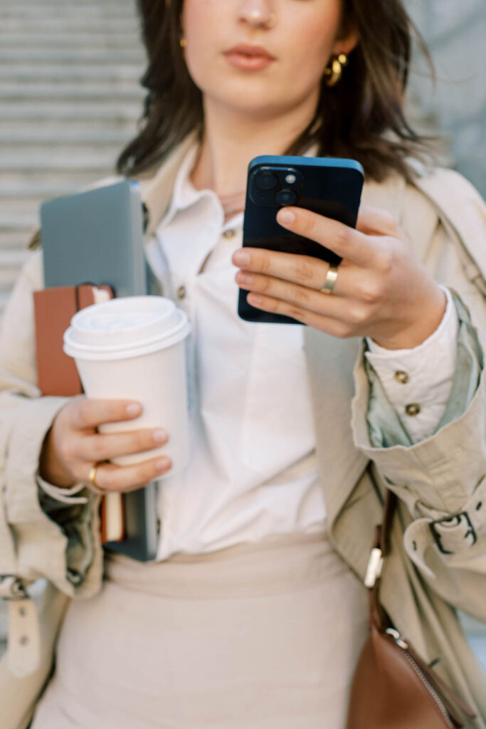 woman looking at cell phone