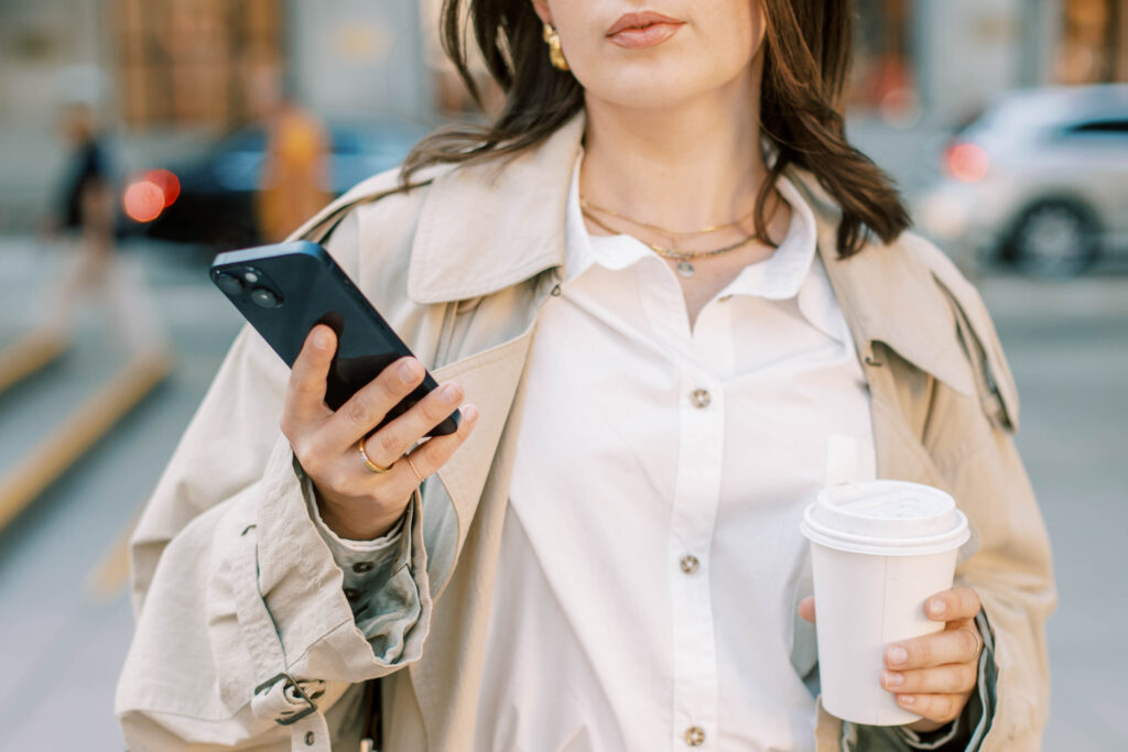 woman looking at cell phone