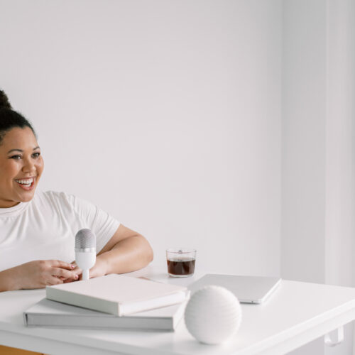woman talking in a microphone