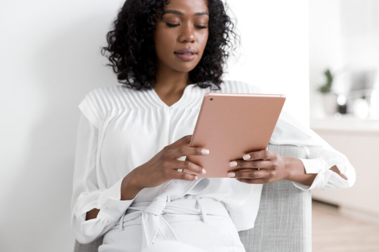 woman looking at an ipad
